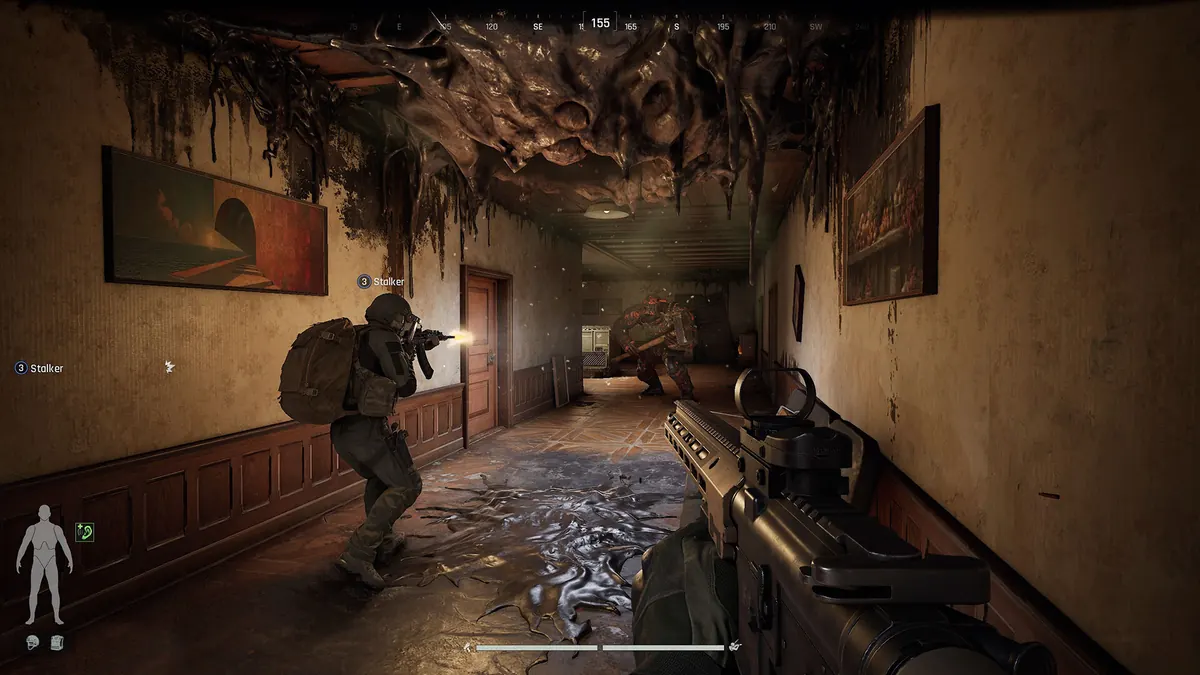 Arena Breakout: Infinite first-person view of an armed operator firing down a decaying hotel hallway